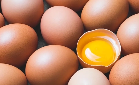 Why are some egg yolks so orange? 