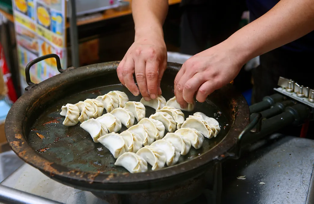 Yakigyoza (Japanese pan fried gyoza 餃子) food stall at the 41st Meguro Pacific Saury Festival, Tokyo, Japan, September 16, 2018.
