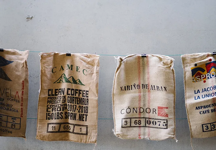 Coffee sacks hanging on a line