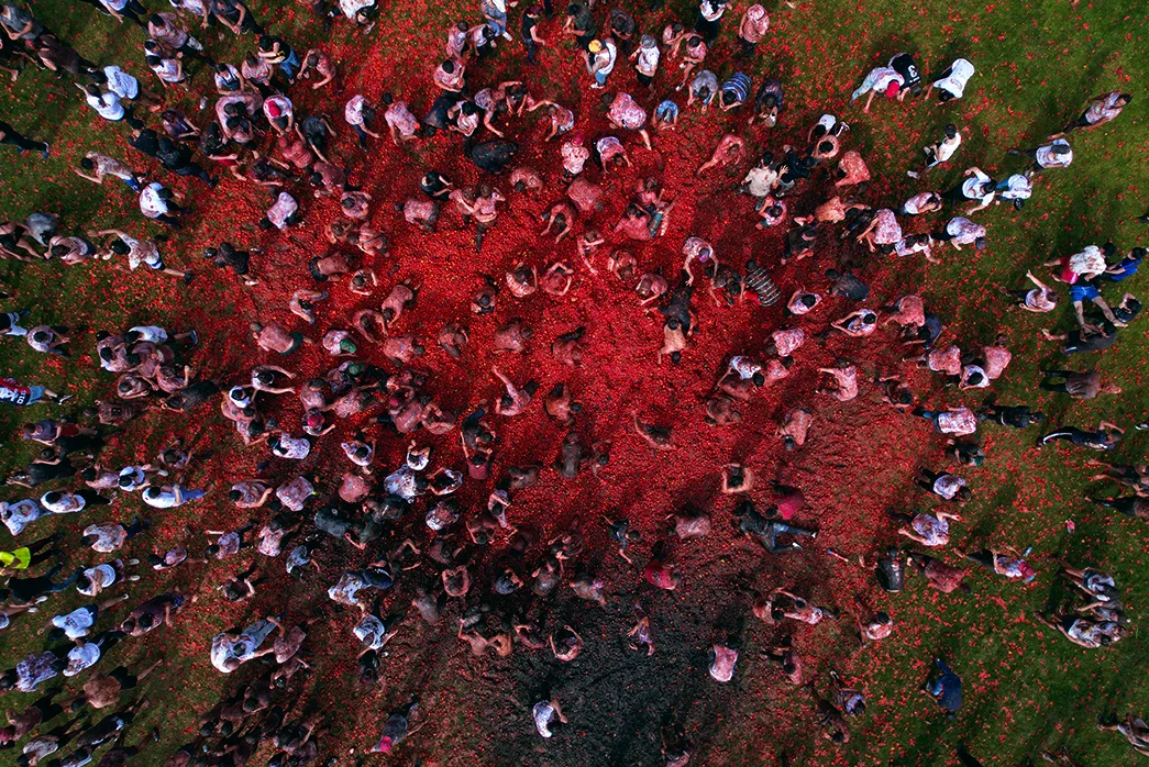 An aerial view of attendants throwing tomatoes at one another during the annual Great Tomatina Colombiana in Sutamarchan